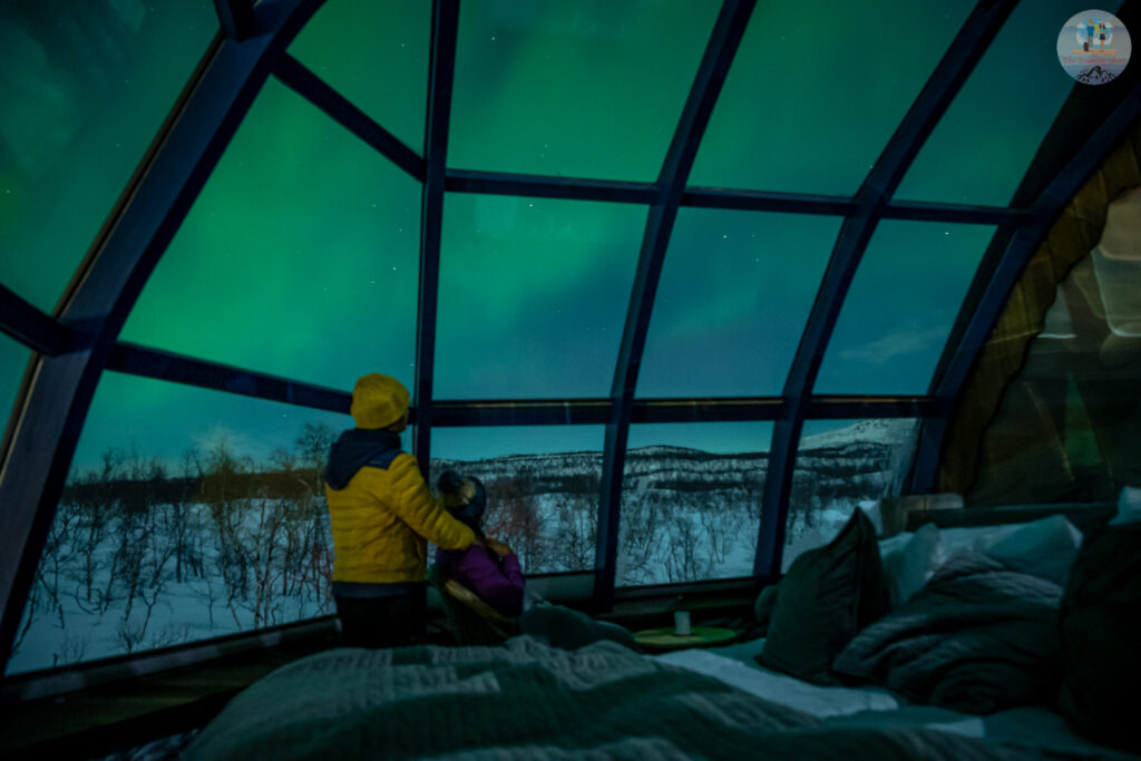 Enjoying the Northern Lights show from our glass igloo in Kilpisjarvi