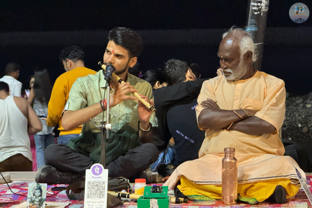 Flute artist at Triveni Ghat